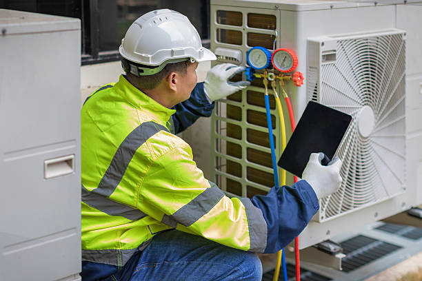 Professional Heat Pump Repair technician working in Hazel Crest, IL